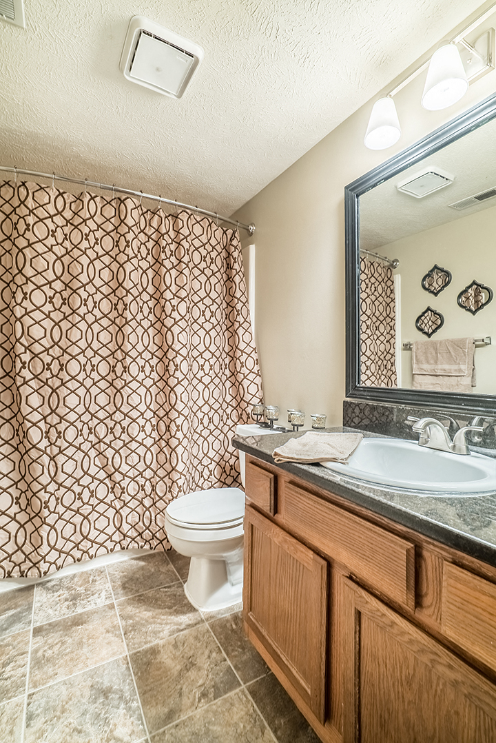 Renovated bathroom with a bathtub at Fountain Glen Apartments