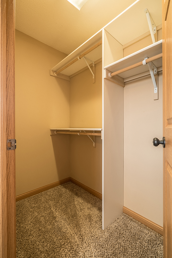 Large closet with lots of storage space and shelving at Grand Legacy Aparmtnets