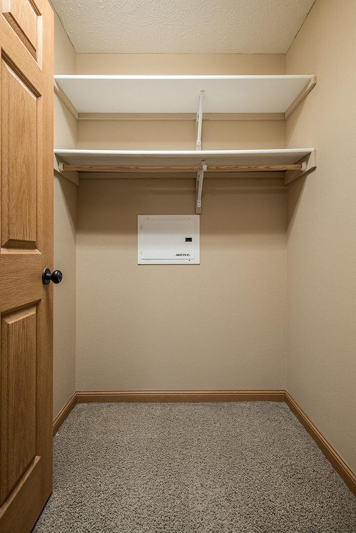 Large closet providing plenty of storage space at Grand Legacy Apartments