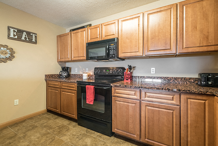 Kitchen with lots of cabinet space at Grand Legacy Apartments