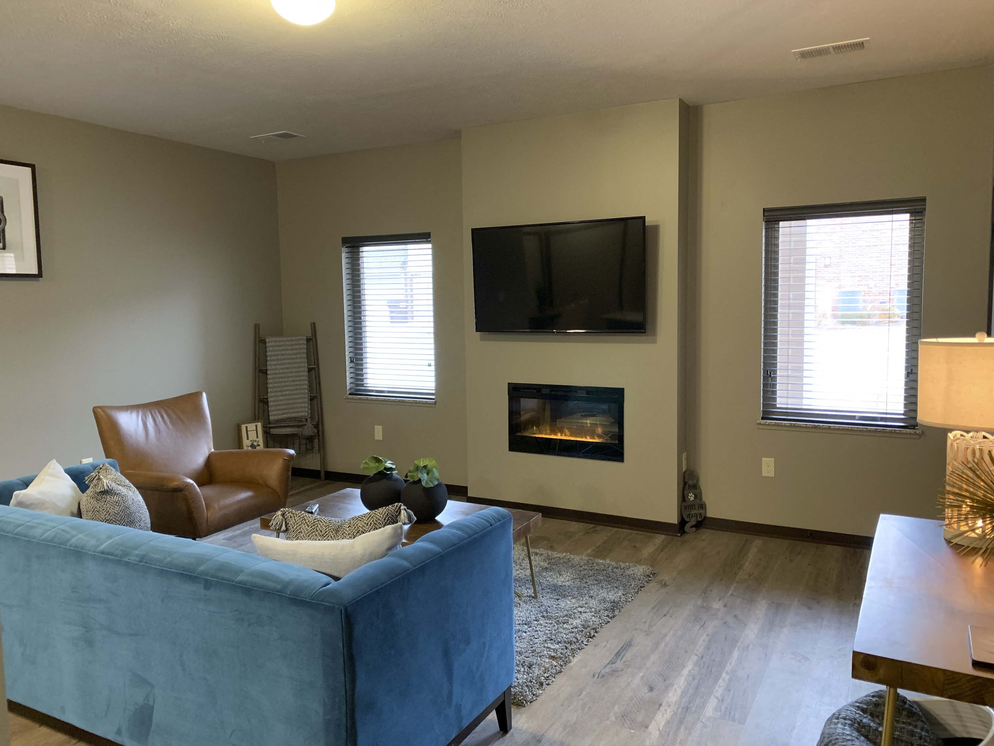 Living room with gas fireplace at North Pointe Villas in north Lincoln