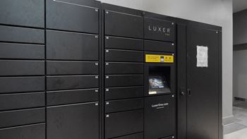 Luxer package locker system providing safe and secure package drop off and pick up at midtown crossing apartments