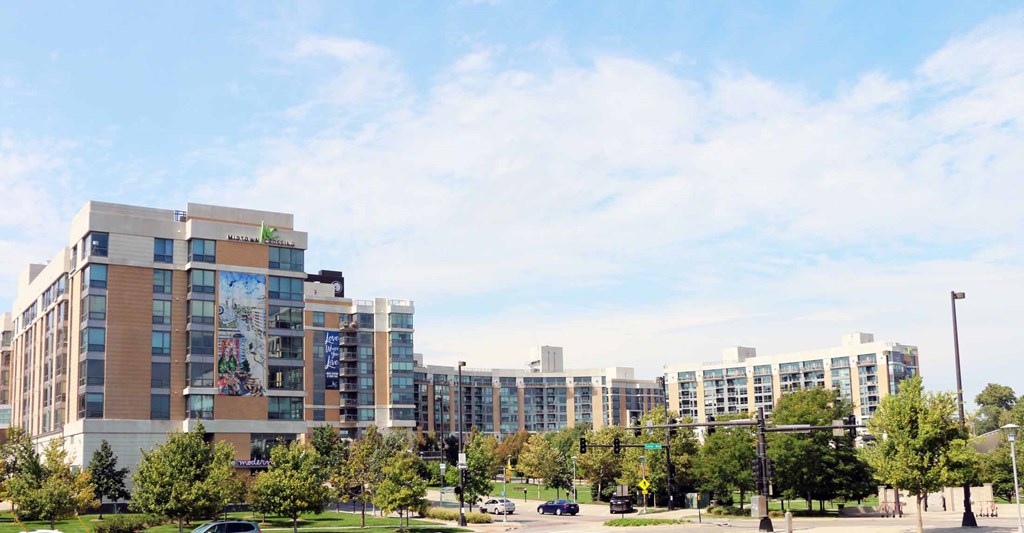 a view of a city with buildings and trees