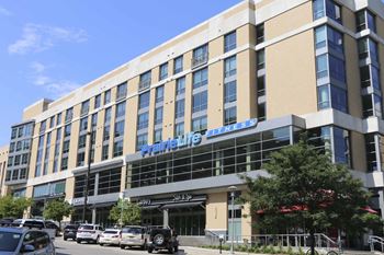 apartments over a PrairieLife Fitness and Genesis gym