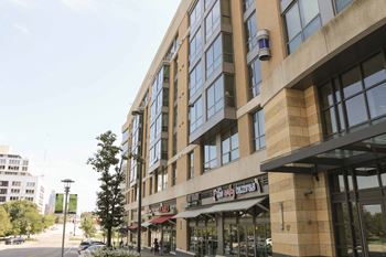 a building of apartments over various stores in Midtown Crossing