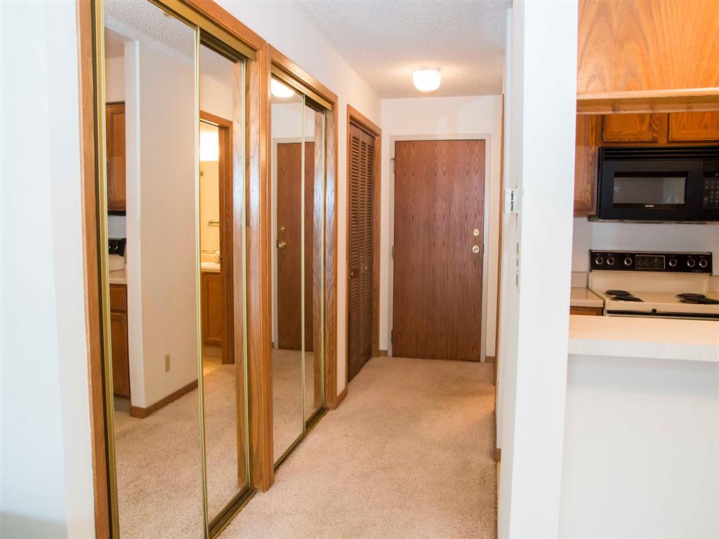 hallway including spacious closets at Capitol View Apartments in Lincoln Nebraska