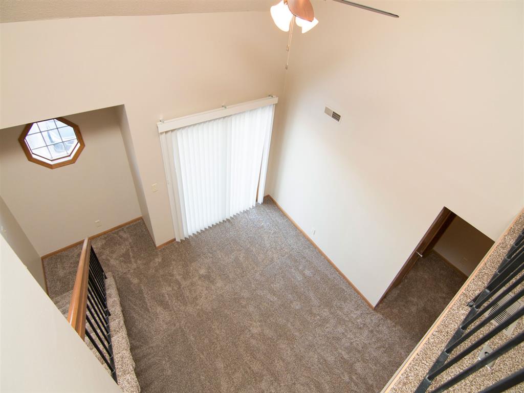 View looking down at the living space from the loft at Fountain Glen Apartments in Lincoln Nebraska