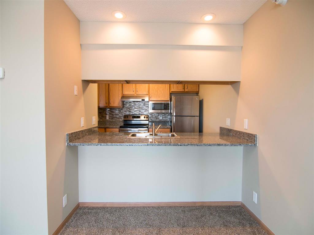 Interiors-Skyline View Apartments Updated Kitchen and Breakfast Bar in Lincoln NE
