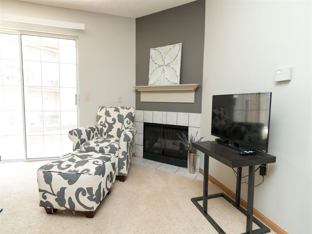 Fireplace in living room at Eagle Run Apartments in Omaha, NE