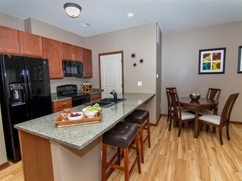 Kitchen with granite countertops at Villas of Omaha at Butler Ridge in Omaha NE - Photo Gallery 62