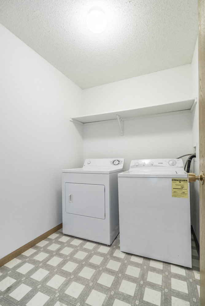 Full size washer and dryer and laundry room included at Northridge Heights Apartments