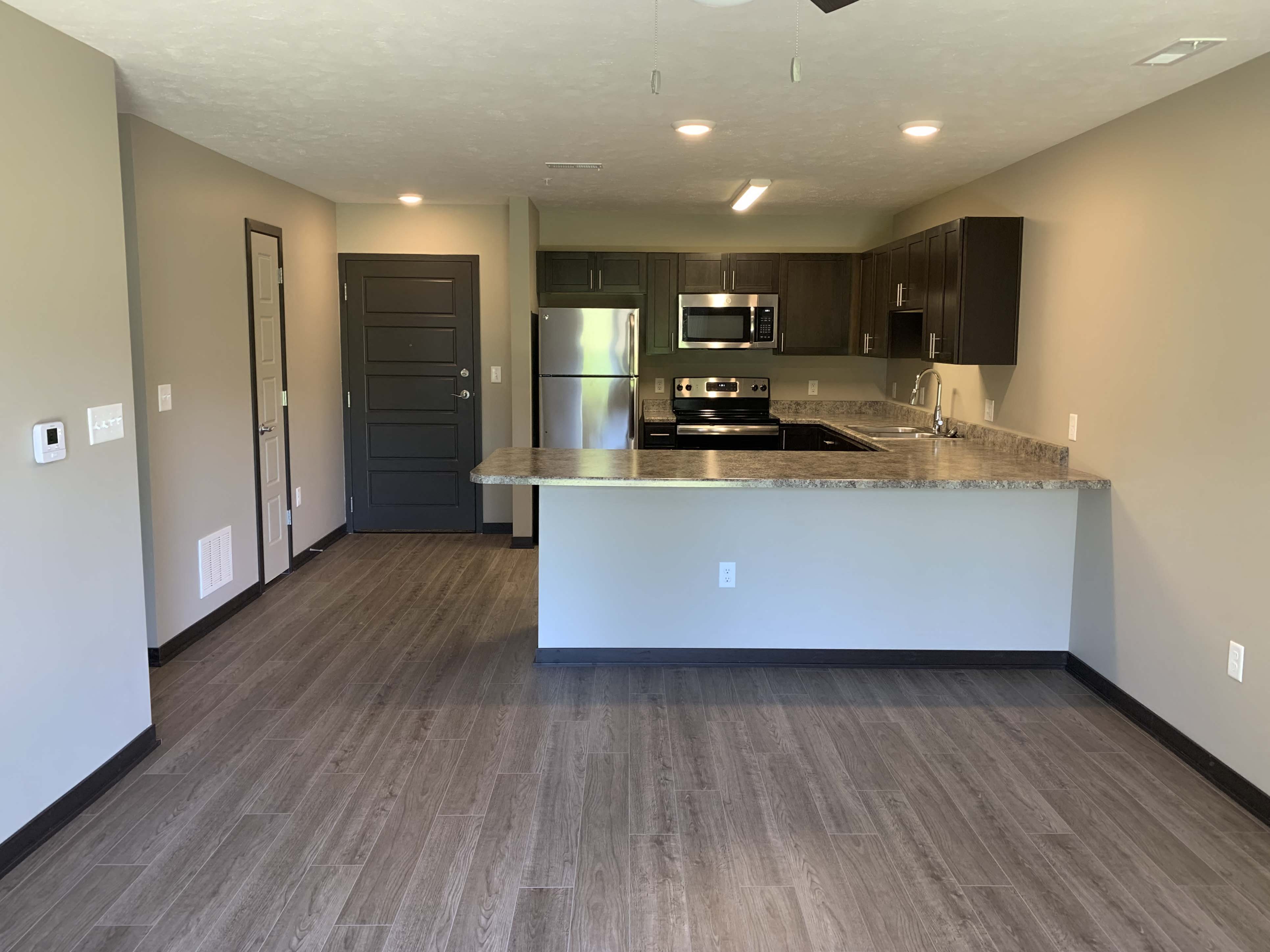 Open concent living room and kitchen at Northridge Heights in north Lincoln