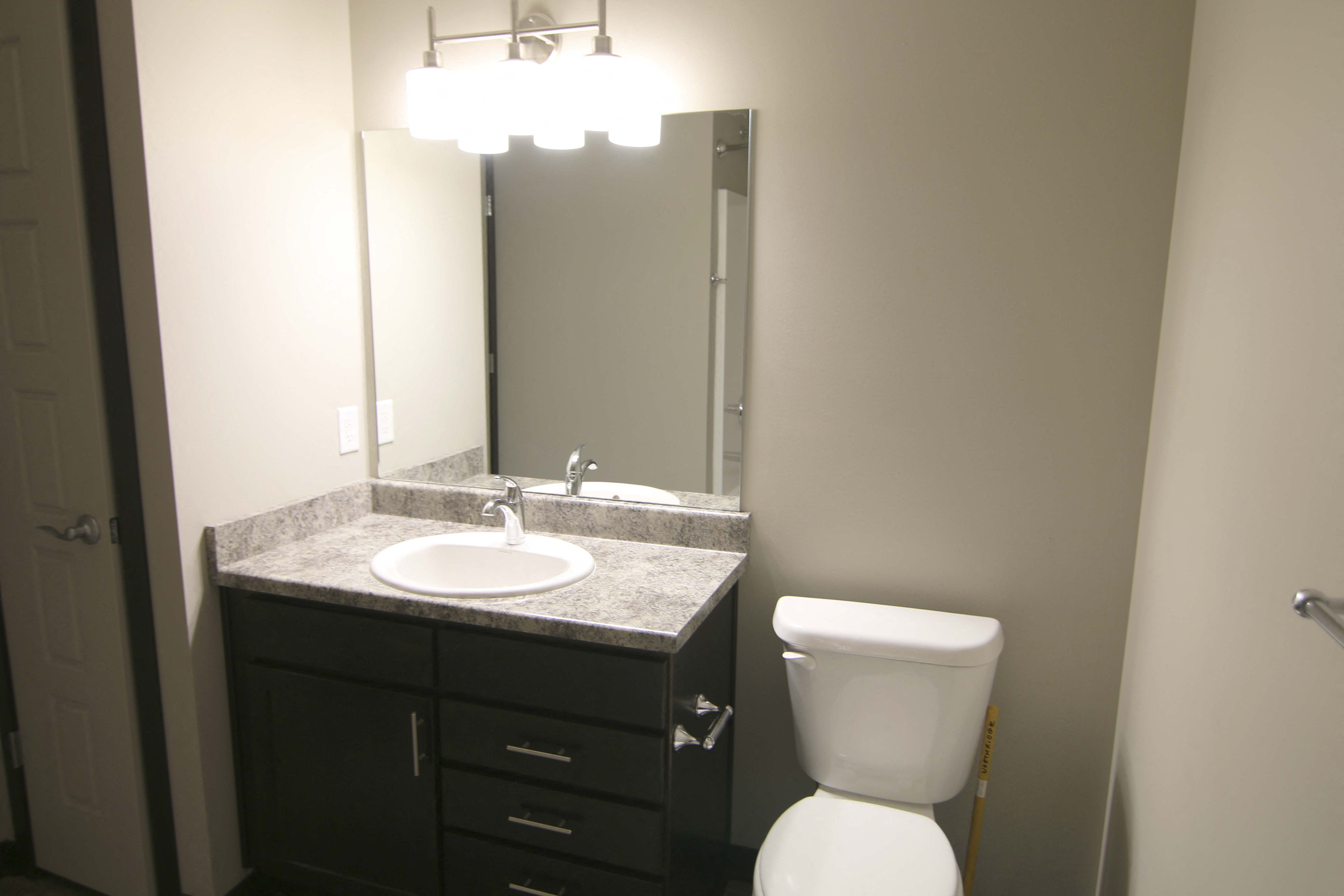 Renovated bathroom with linen storage closet at Northridge Heights in north Lincoln