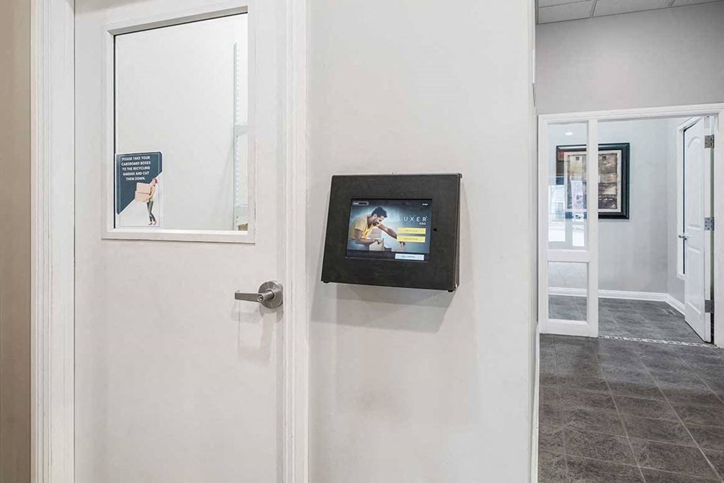 a mail room with a Luxor package locker system