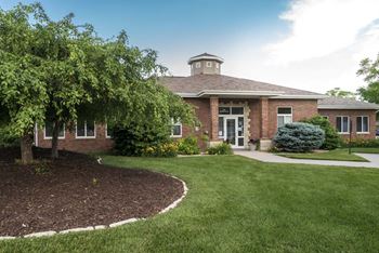 Exterior of clubhouse at Pinebrook Apartments