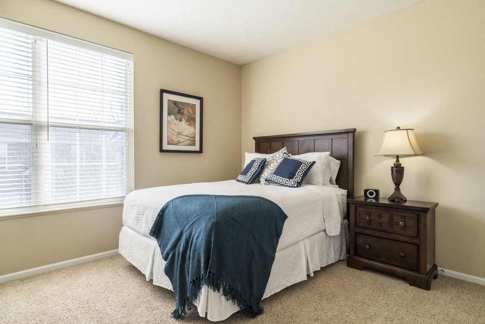Interiors-Master bedroom with king-sized bed at Ridge Pointe Villas