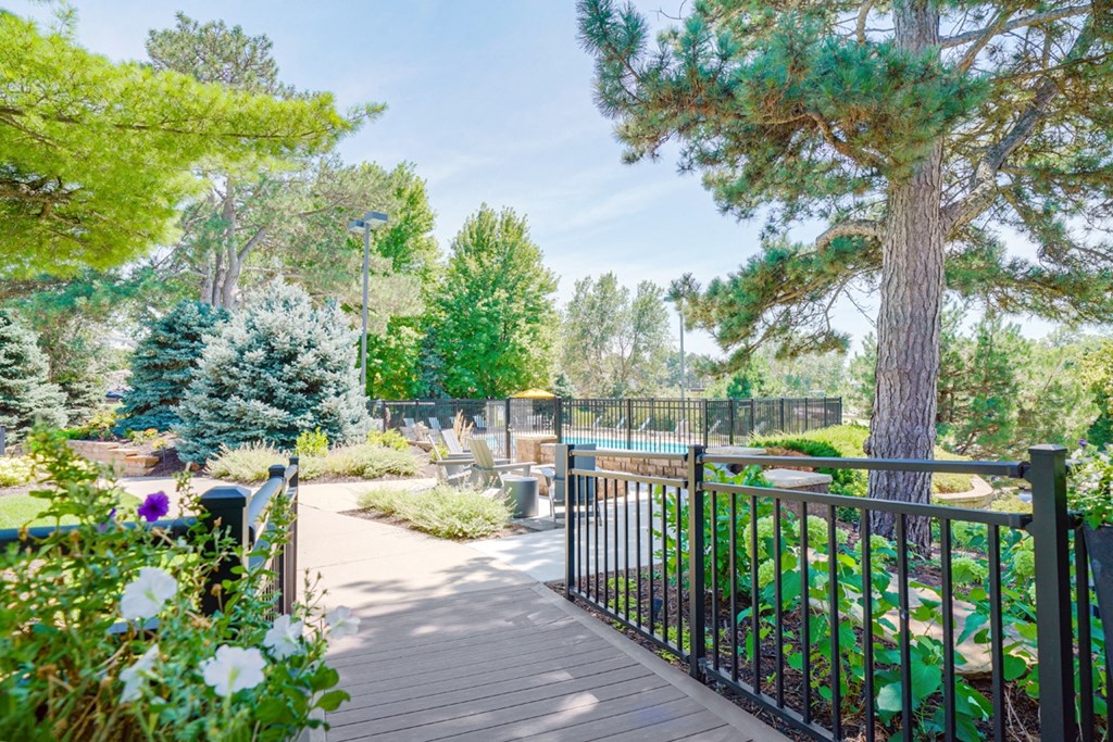 Walkway leading to the community fire pit and gated swimming pool