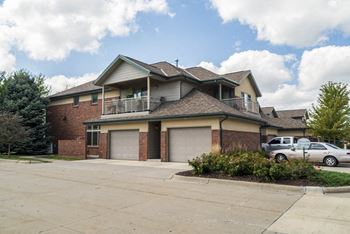 View of villas with attached garages and balconies at Southwind Villas in southwest Omaha in La Vista, NE, 68128
