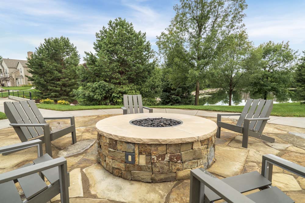 Outdoor fire pit and seating at Stone Ridge Estates