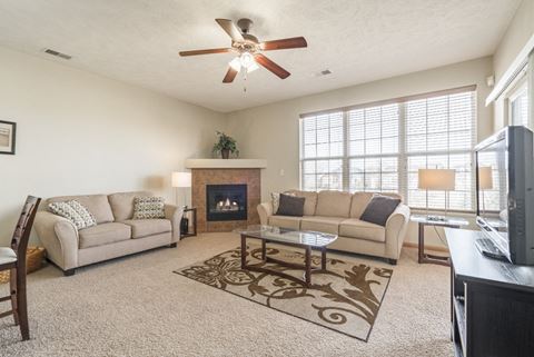 Interiors-Large windows with natural light in the living room at Stone Ridge Estates townhomes