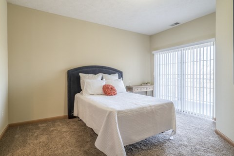 bedroom with bed and window