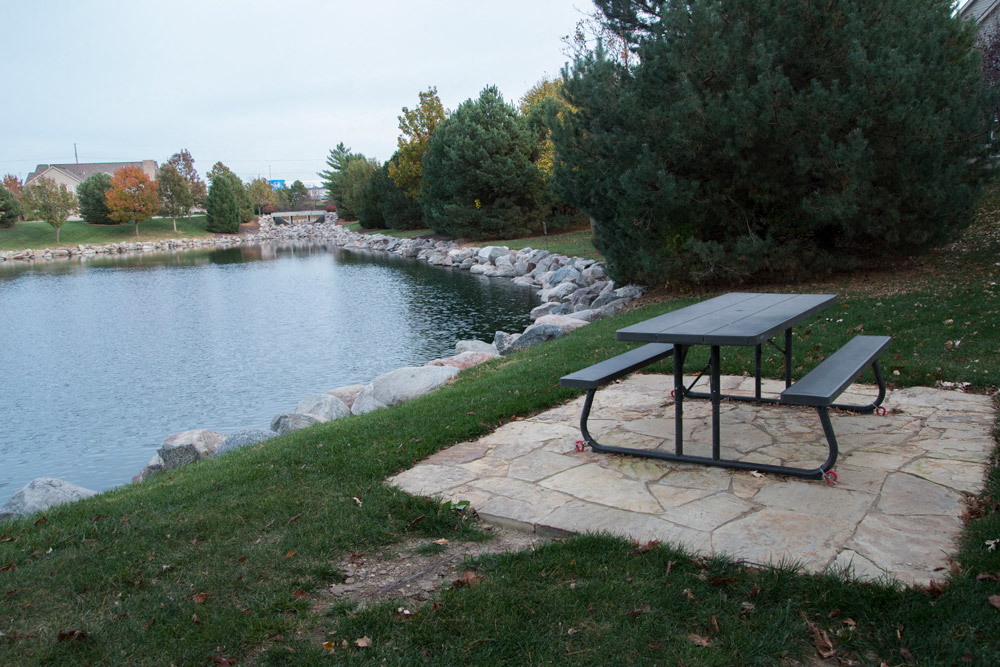 Picnic area overlooking private pond at Stone Ridge Estates in Lincoln NE