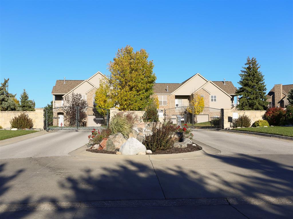 View of gated entryway to Stone Ridge Estates' townhome style villas
