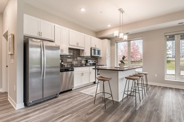 Interiors- Design A-White cabinets and dark countertops-The Preserve at Normandale Lake