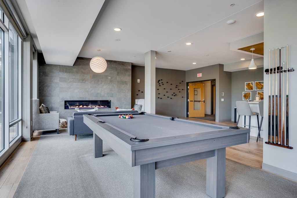 The Club Room features a pool table, big screen TV, and a gourmet kitchen
