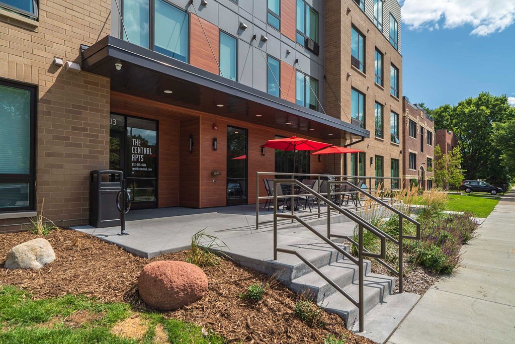 Entrance and patio of The Central apartments near uptown and downtown Minneapolis MN