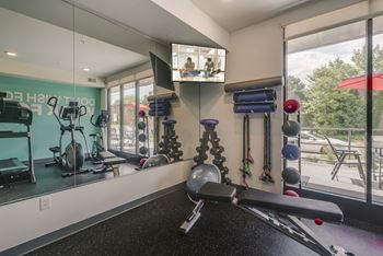 Fitness Center with cardio equipment at The Central apartments near downtown Minneapolis MN 55408