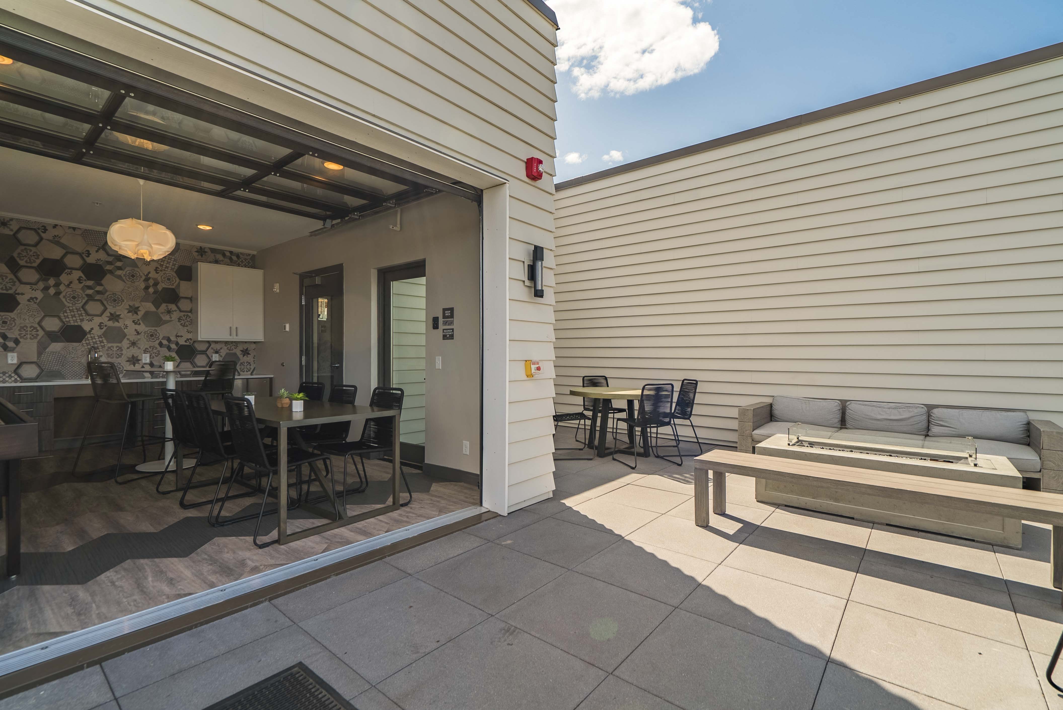 Rooftop deck and outdoor firepit at The Central apartments near downtown Minneapolis MN 55408