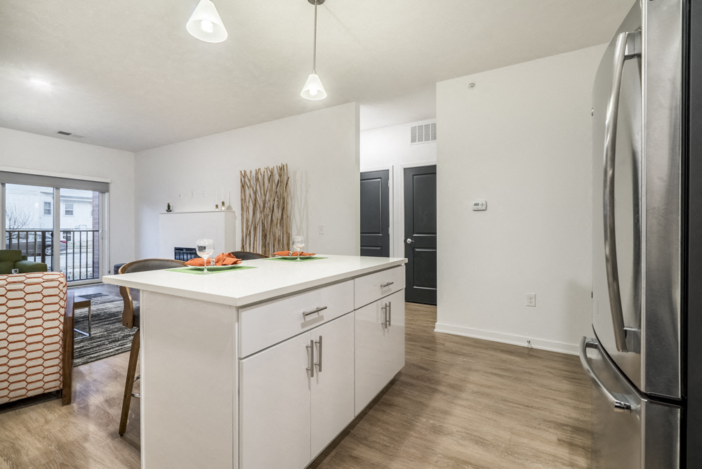 Kitchen island in 1 bedroom apartment for rent in contemporary design at The Conrad apartments