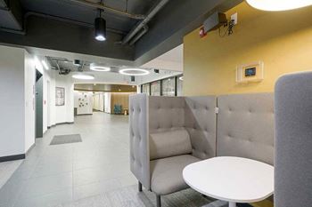 a modern cushioned booth perfect for studying or working from home