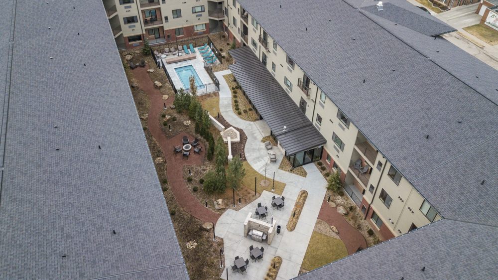 Courtyard with pool at The Conrad apartments in Blackstone District Omaha NE