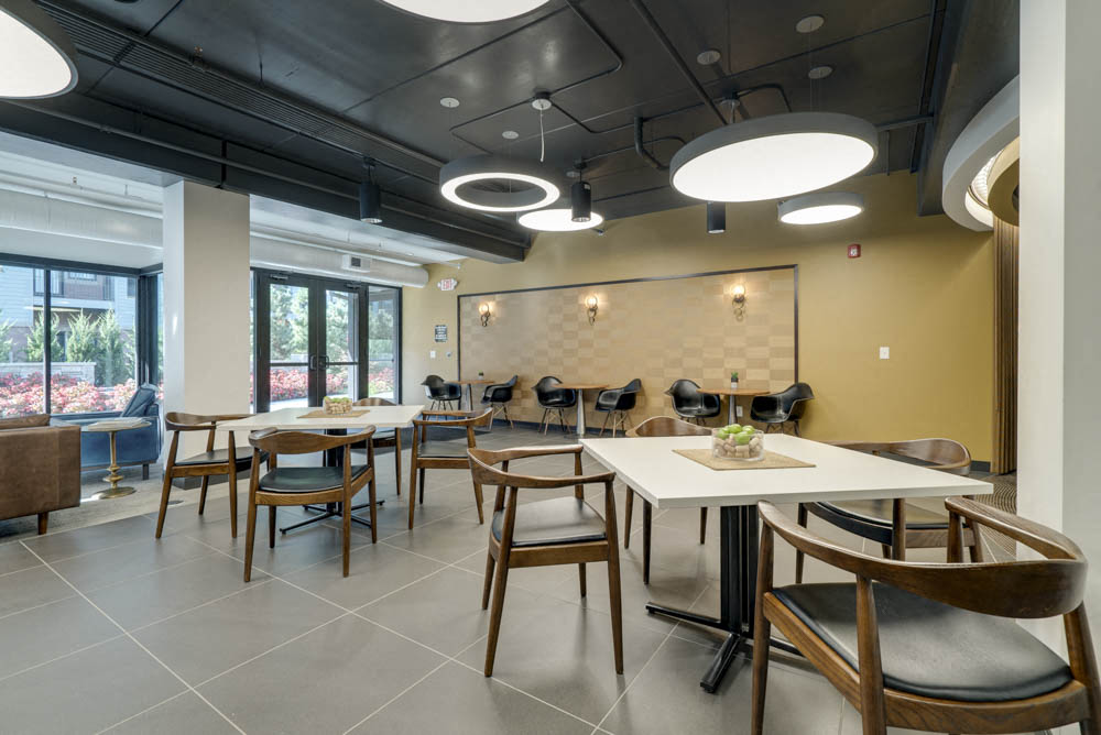 Tables and seating at The Conrad near UNMC in the Blackstone District Omaha NE 68105
