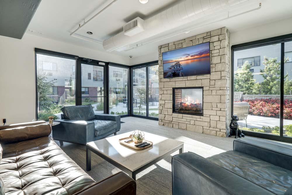 TV lounge with views of pocket park at The Conrad near UNMC in the Blackstone District Omaha NE 68105