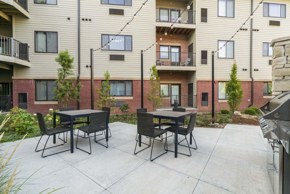 Outdoor seating with grills at The Conrad near UNMC in the Blackstone District Omaha NE 68105