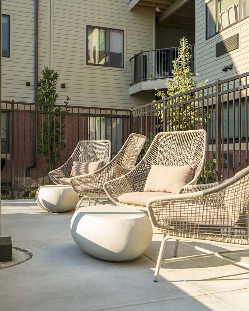 Trendy seating near the hybrid pool/hot tub at The Conrad near UNMC in the Blackstone District Omaha NE 68105