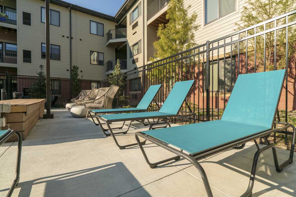Lounge chairs near the hybrid pool/hot tub.