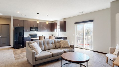 Furnished apartment living area with sofa and coffee table