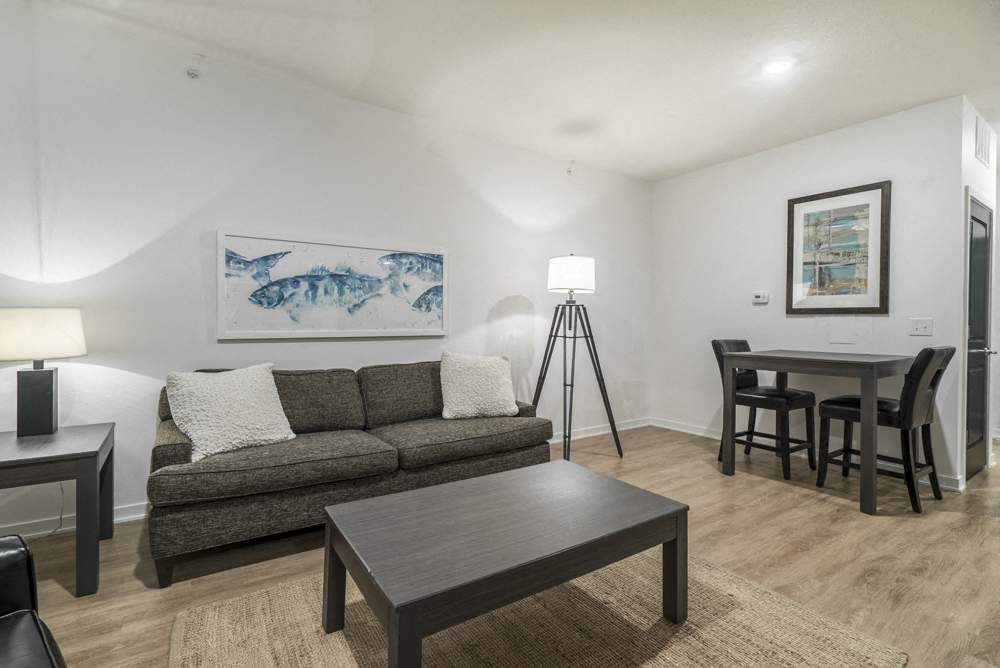 Living room of spacious studio apartment at The Conrad near UNMC Omaha