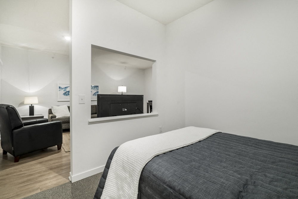 Studio apartment for rent with view of living room at The Conrad in midtown Omaha NE