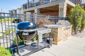 community bbq grill in front of the community clubhouse