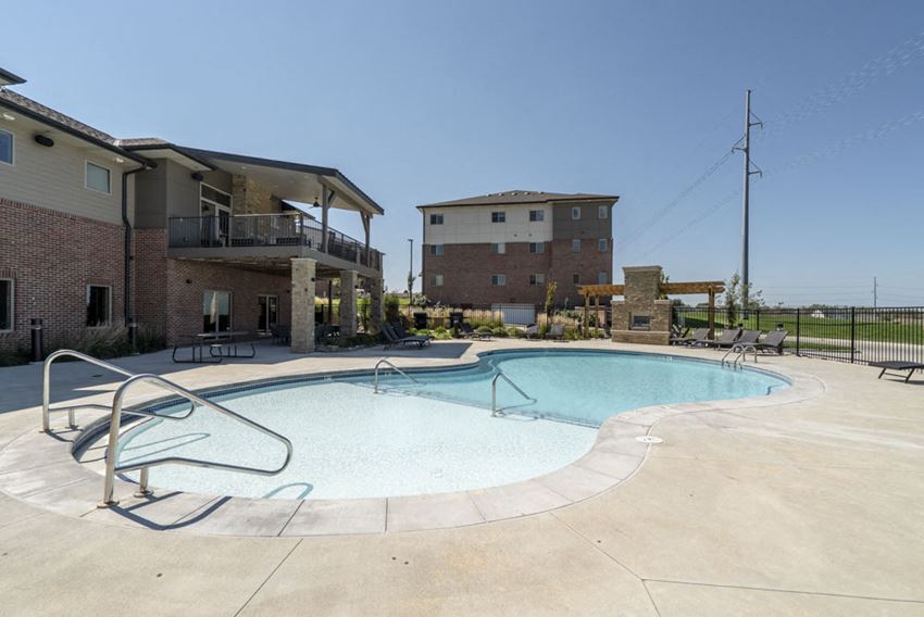 Resort-style pool at The Flats at 84 in southeast Lincoln NE 68516 - Photo Gallery 1