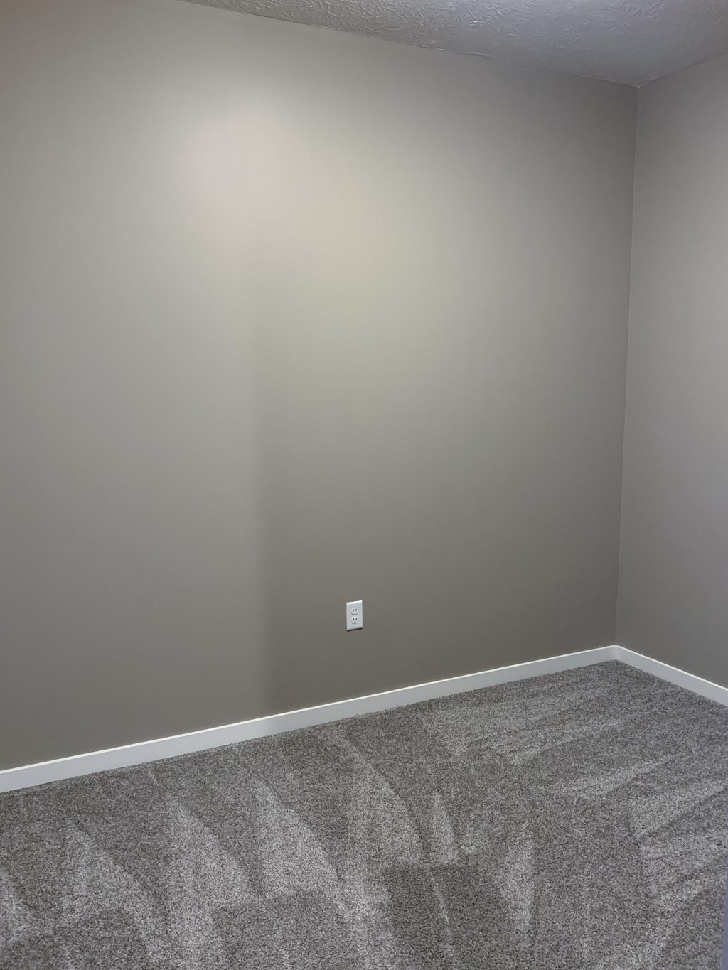 Small bedroom in the Plum studio apartment at the flats at shadow creek