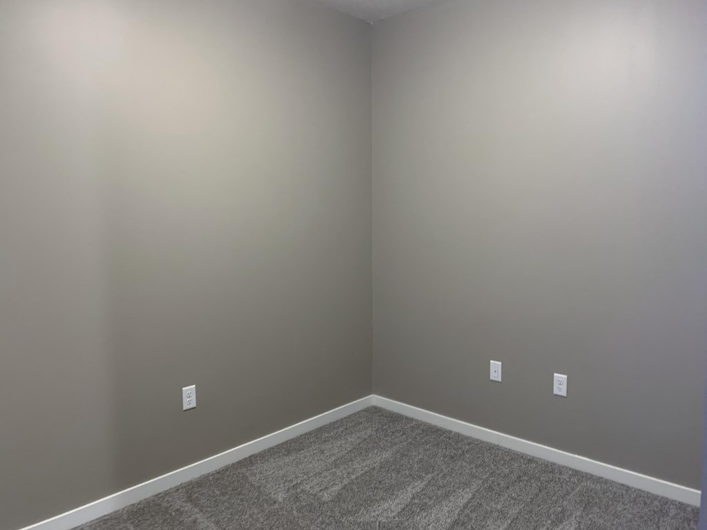 Small bedroom in the Plum studio apartment at the flats at shadow creek