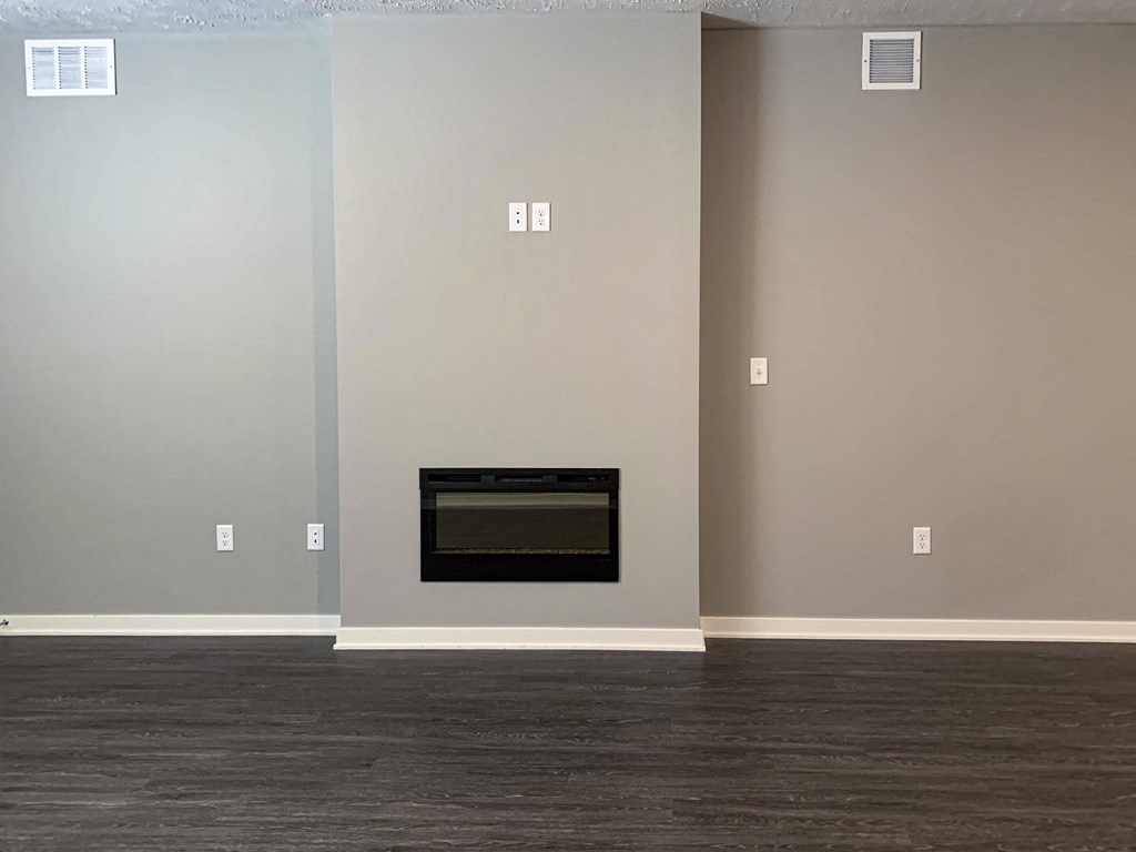 Electric fireplace in living room wall of the buffalo floorplan