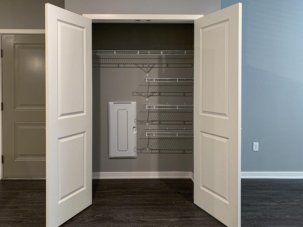 Large storage closet with ample shelving space at the flats at shadow creek