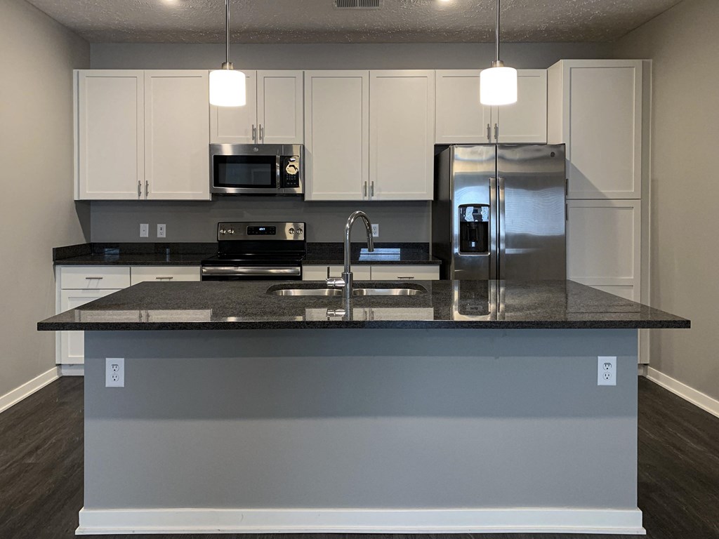 Living and dining area leading into the kitchen in the buffalo floorplan at the flats at shadow creek in the buffalo floorplan at the flats at shadow creek in Lincoln NE